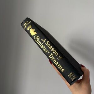 A Season of Sinister Dreams Hardcover Book